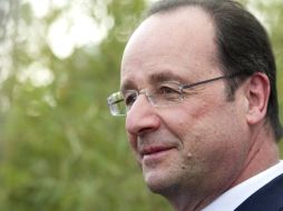 El presidente Hollande en su pasada visita al país expresó que desea redoblar las relaciones comerciales con México. AFP /
