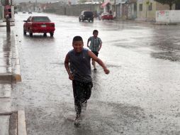 Dominarán lluvias ligeras con vientos de hasta 60 kilometros por hora en algunos estados del país. ARCHIVO /