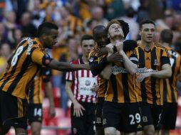 Stephen Quinn marcó el cuarto gol para el Hull en el minuto 67. AP /