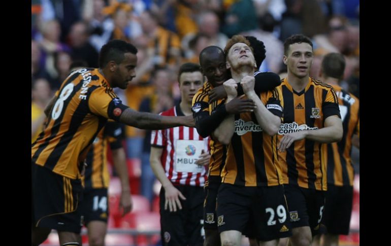 Stephen Quinn marcó el cuarto gol para el Hull en el minuto 67. AP /