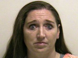 Megan Huntsman es fichada con seis cargos de homicidio. AP /
