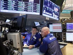 Compañías norteamericanas declararon buenas ganancias, despues de que los precios de las acciones cerraran en alza este miércoles. AP /
