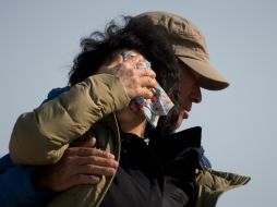 Familiares de las víctimas continúan a la espera de más información sobre el terrible accidente. AFP /