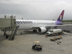 El FBI y la Administración de Seguridad del Transporte investigan cómo el adolescente pudo violar la seguridad y llegar al avión. AP /