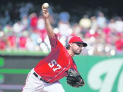 El lanzador derecho Tanner Roark, de los Nacionales de Washington, realizó 156 lanzamientos, ponchando a ocho. AP /