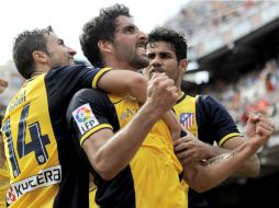 El cuadro Colchonero está cada vez más cerca de llevarse la Liga Española. EFE /