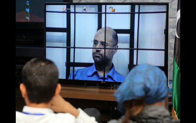Amnistía Internacional considera un riesgo la transmisión del juicio de Al Islam por satélite. AFP /