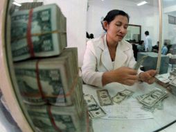 Se estima que el tipo de cambio oscile en un rango de 13.06 y 13.12 pesos. ARCHIVO /