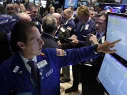 La mayoría de los principales índices de la Bolsa de Valores de Nueva York opera con leves ganancias. AP /