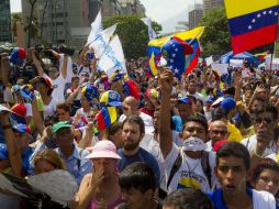 Opositores al gobierno de Nicolás Maduro participan en una manifestación en Caracas. EFE /