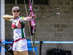 Aída Román ganó dos medallas, una con Juan René Serrano y otra en equipo femenil. ARCHIVO /