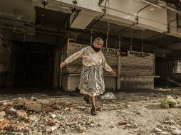 Mientras llega el dictamen de ciencias forenses, locatarios del Mercado Corona entrarán al inmueble para rescatar lo que se pueda.  /