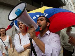Estudiantes opositores al régimen de Nicolás Maduro aseguran que la mayoría de la población simpatiza con las protestas. ARCHIVO /