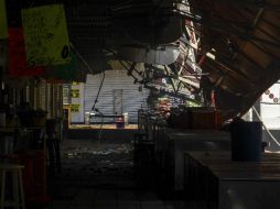 Locatarios perdieron sus pertenencias por el incendio que según peritajes, inició por una falla eléctrica en los pisos altos.  /