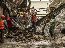 Comerciantes del Mercado Corona  perdieron su fuente de ingresos,cuando éste se incendió el domingo pasado.  /
