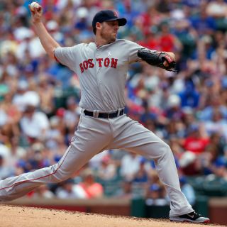 Lackey y Pedroia se combinan en el triunfo de los Medias Rojas