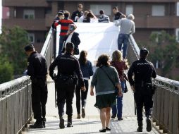 La policía ya investiga la posible participación de una mujer que fue detenida. ARCHIVO /