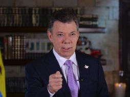 ''Esto es lo más lejos que jamás se haya llegado en el camino para terminar esta guerra'', dice Santos. NTX /