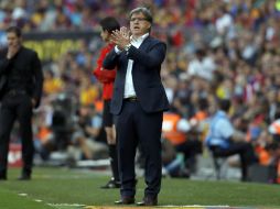 'Quiero felicitar al Atlético, agradecer al club, al presidente y a Sandro Rossel, por haber confiado en mí', aseveró Gerardo Martino. AP /