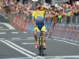Rogers aventajó con ocho segundos al grupo que lo perseguía y llegó solo a la meta. AFP /