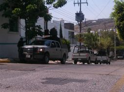 Elementos de la Marina custodian un inmueble en el 3059 de la calle Batalla de Bachimba, al cruce con Plan de San Luis.  /