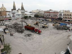 La propuesta es que los comerciantes afectados por el incendio queden eximidos del pago hasta que se reconstruya el mercado. ARCHIVO /