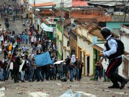 Protestas callejeras contra la inflación, y un alto índice de delincuencia han dejado 42 muertos desde febrero en Venezuela. AFP /