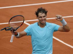 Rafael Nadal celebra su victoria en segunda ronda. El español busca su noveno título en la arcilla de París. AFP /
