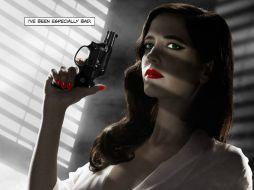 Green aparece en el poster sólo con una bata de seda, con una pistola en la mano y en una pose retadora.  /