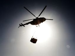 El Mi-8 se desplomó, por causas aún desconocidas, en el lago Munozera, ubicado en la región de Murmansk, Rusia. ARCHIVO /