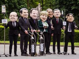 Algunos manifestantes se han pronunciado en contra de la llegada de los presidentes a Bélgica. AP /