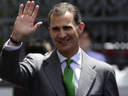 El hijo del rey Juan Carlos hereda, a sus 46 años, un país duramente afectado por la crisis económica. AFP /