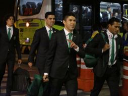 Jugadores de la Selección a su llegada al aeropuerto internacional de Sao Paulo. AP /