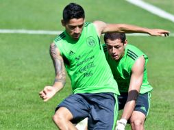 Algunas empresas permitirán que se vean los juegos para evitar ausencias. AP /