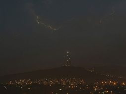 Para Jalisco, Colima y Michocán, el SMN pronostica lluvias intensas con tormentas eléctricas. ARCHIVO /