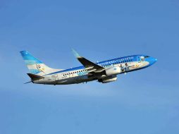 La Albiceleste viaja en un Boeing 737-700 de Aerolíneas Argentinas especialmente acondicionado para la ocasión. EFE /