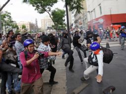 Reportan agresiones por parte de anarquistas a reporteros de diversos medios. SUN /