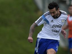 Ezequiel Lavezzi estaría junto a Lionel Messi y Sergio Agüero al frente de su equipo. AFP /