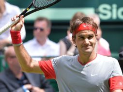 El tenista suizo logra el pase a la semifinal del torno de la ATP de Halle en Alemania. AFP /