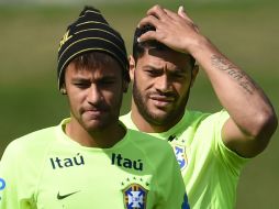 El atacante (d) apenas participó 15 minutos en el entrenamiento. AP /