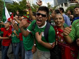 Los visitantes tricolores han inundado Brasil para apoyar a la Selección mexicana. AFP /