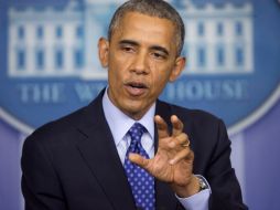 Obama se reúne con sus asesores de seguridad nacional en la Casa Blanca para discutir la situación en Iraq. AP /
