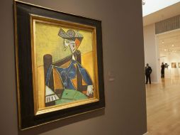 Más de 280 piezas, entre imágenes de Douglas y obras originales del artista, son expuestas en el Palacio de Bellas Artes. ARCHIVO /