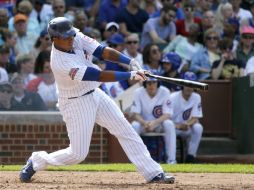 Starlin Castro dispara el cuadrangular en el tercer episodio, en el que los Cachorros anotaron cinco veces. AP /
