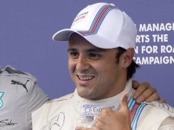El piloto de de la escudería Williams celebra su ''pole position'' al marcar el mejor tiempo en la última sesión de la F1. AFP /