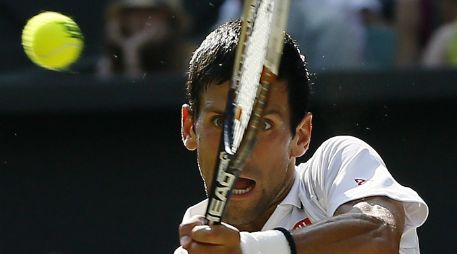 El tenista Novak Djokovic, busca reconquistar el título ganado en el All England Club en 2011. AP /