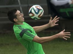 El mediocampista mexicano aparece en la primera alineación ideal de la FIFA. AP /