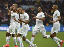 Los jugadores de Argelia celebran su triunfo sobre la Selección de Corea del Sur. AP /