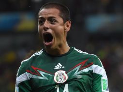 Sobre las lágrimas que derramó tras hacerse presente en el marcador, el 'chicharito' dice que fueron de emoción. AFP /
