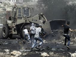 La batalla entre israelíes y palestinos continúa en esa región. AFP /